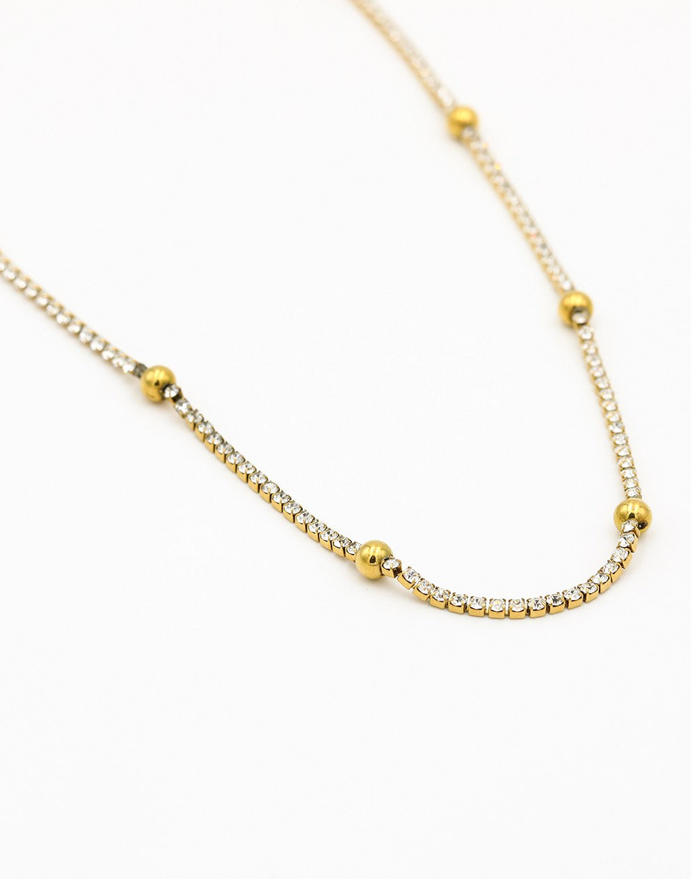 Tennis ketting bolletjes goudkleurig