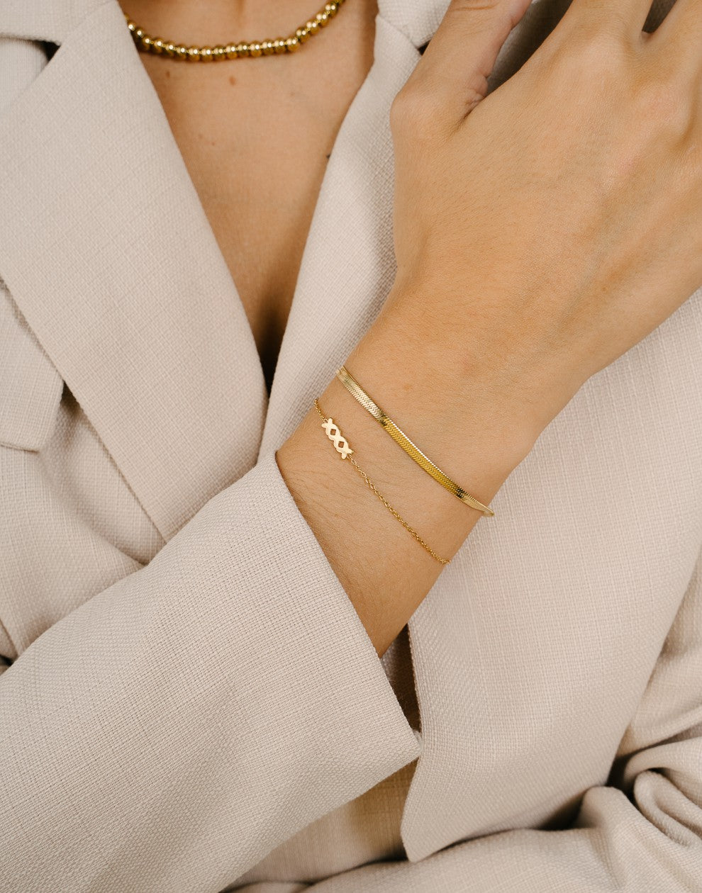 Armband Amsterdamse kruisjes goudkleurig