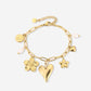 Bedelarmband flower love goudkleurig