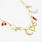ovale schakelketting met bedels goudkleurig