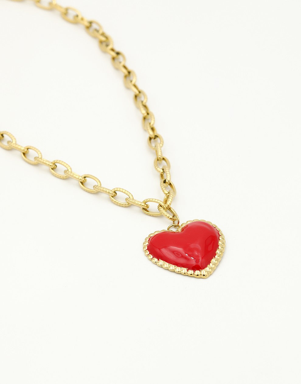 lange ketting met rood hart goudkleurig