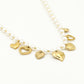 parelketting met vintage hartjes bedels