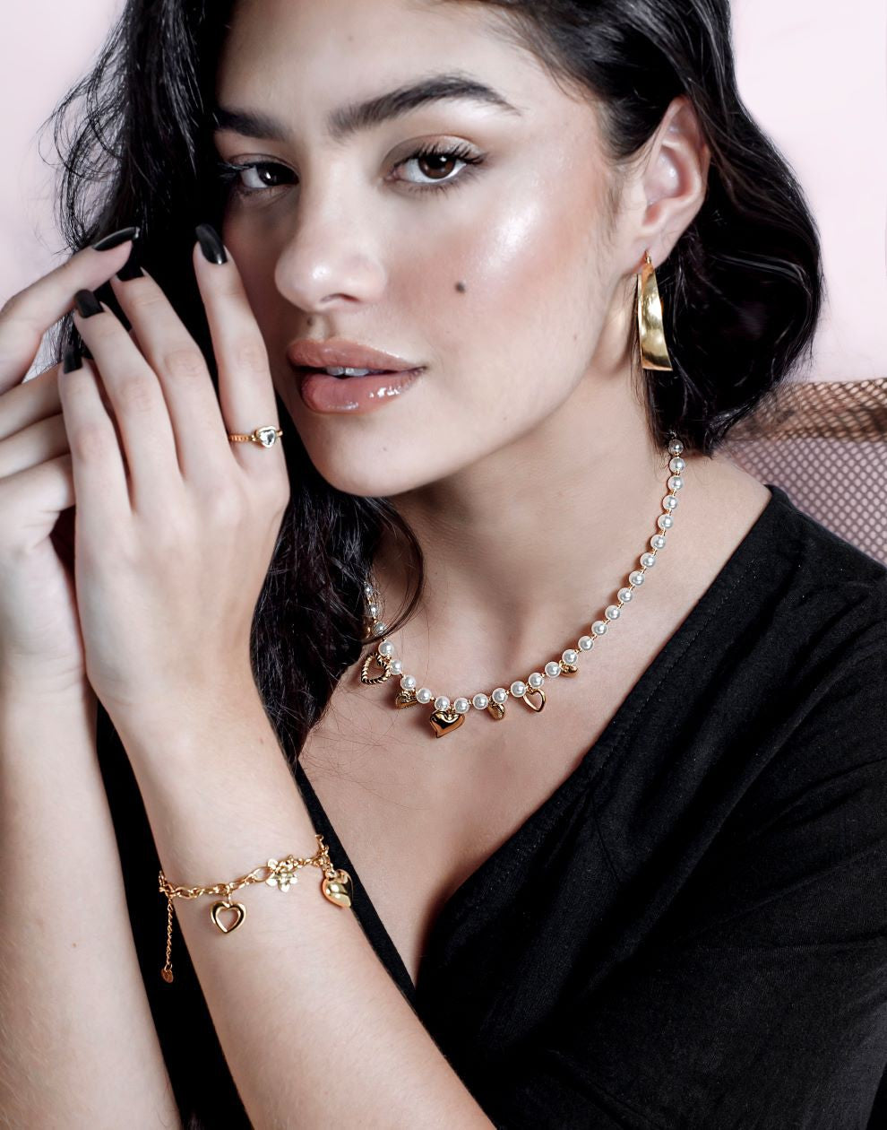 parelketting met vintage hartjes bedels