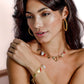 ovale schakelketting met bedels goudkleurig