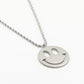 lange ketting smiley hanger zilverkleurig