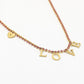 Tennis ketting love roze