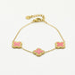 armband roze klavers goudkleurig
