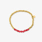 kralenarmbandje roze goudkleurig