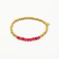 kralenarmbandje roze goudkleurig