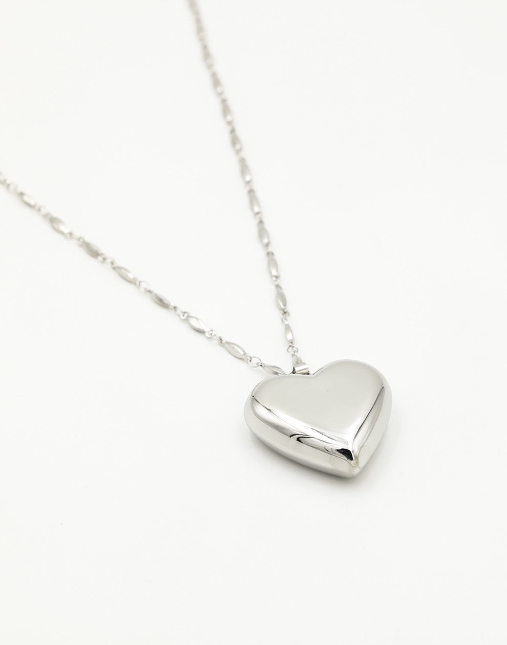 Lange ketting met groot hart zilverkleurig