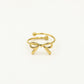 Ring strikje goudkleurig