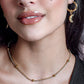 Tennis ketting bolletjes goudkleurig