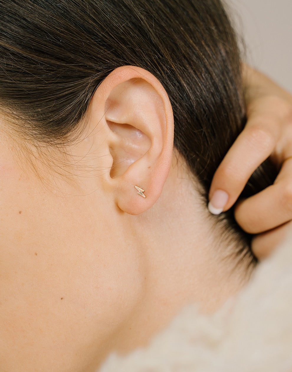 Bliksem earstuds goudkleurig