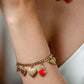Bedelarmband multi hartjes goudkleurig