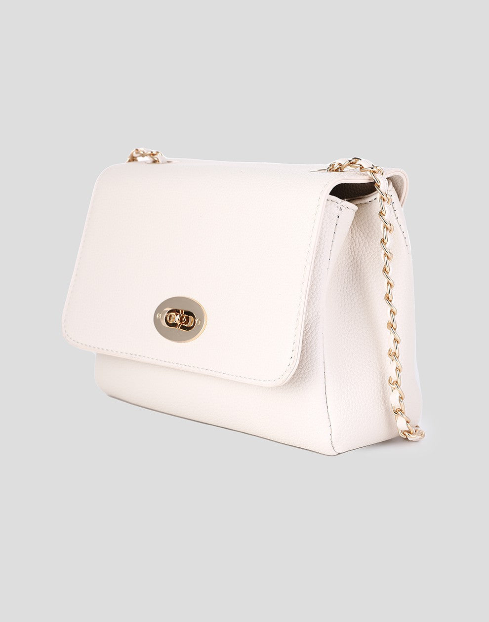 beige damestas crossbody met chain