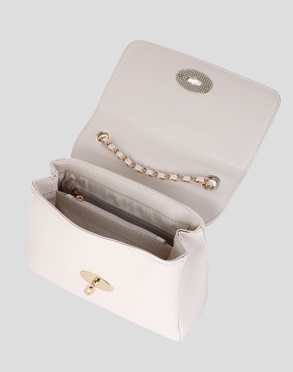 beige damestas crossbody met chain