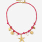 fuchia touw ketting met zeester bedels