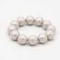 Grote kralen armband beige