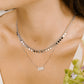 Ketting jaartal 2000 zilverkleurig