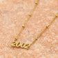 Ketting jaartal 2002 goudkleurig