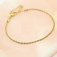 Gedraaide armband goudkleurig