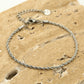 Gedraaide armband zilverkleurig