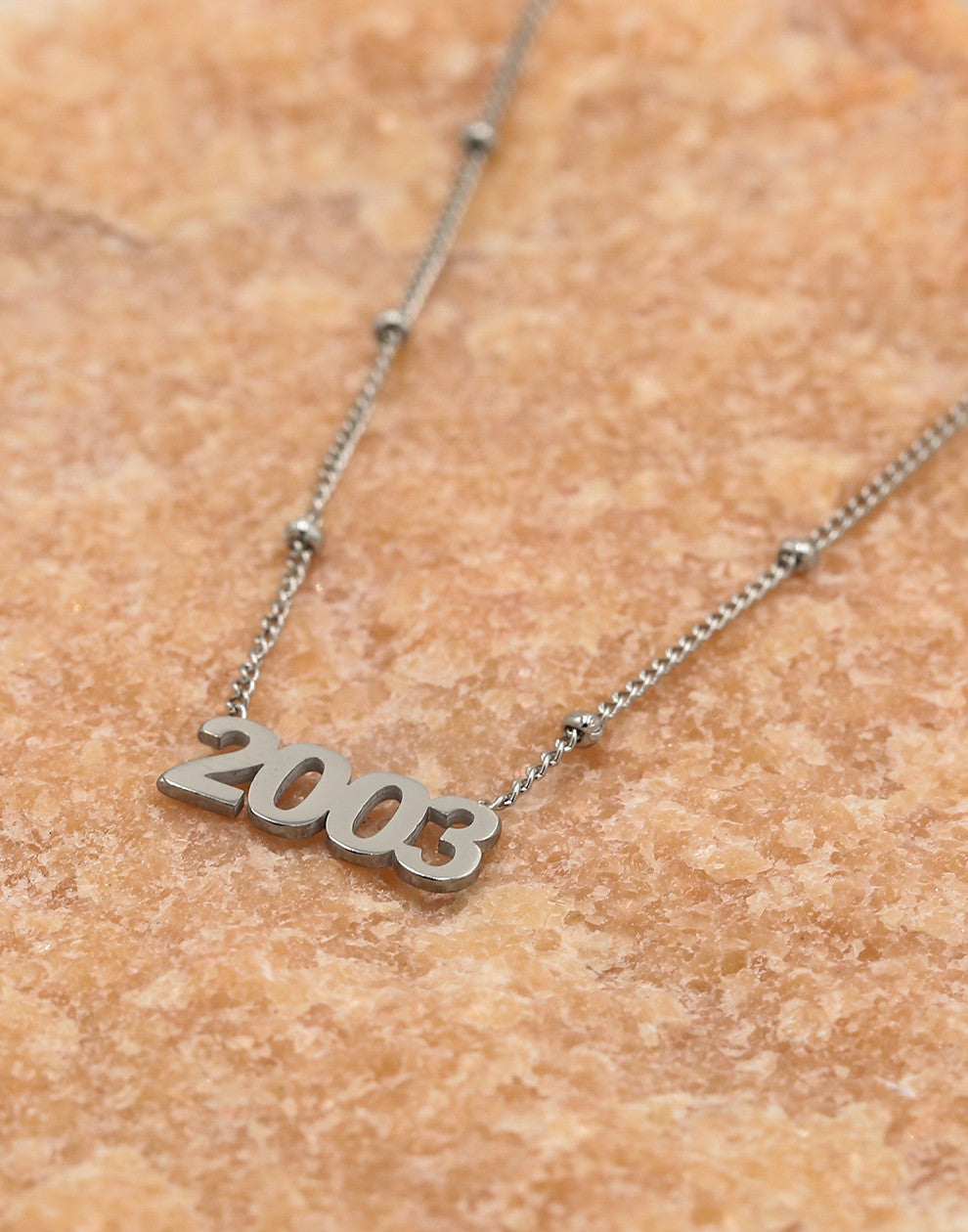 Ketting jaartal 2003 zilverkleurig