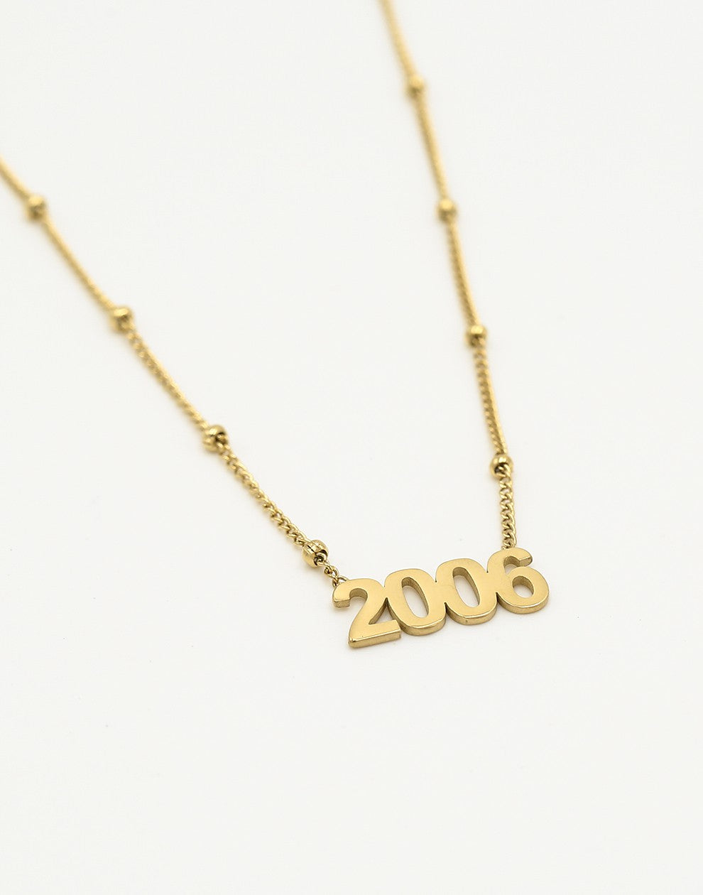 Ketting jaartal 2006 goudkleurig