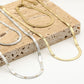 Flat snake chain ketting met hartjes print zilverkleurig