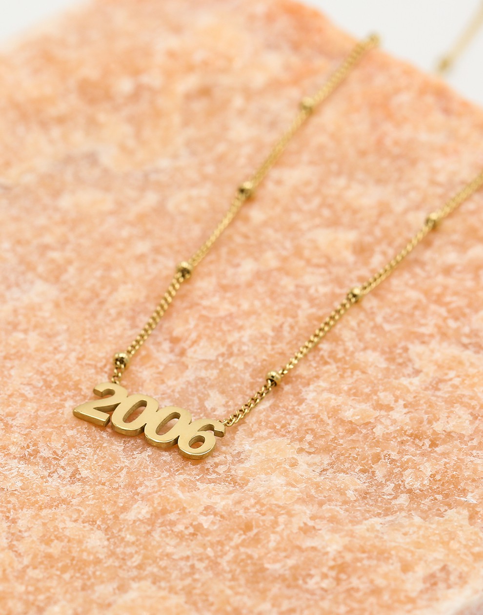 Ketting jaartal 2006 goudkleurig