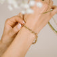Coarse gold-colored link bracelet