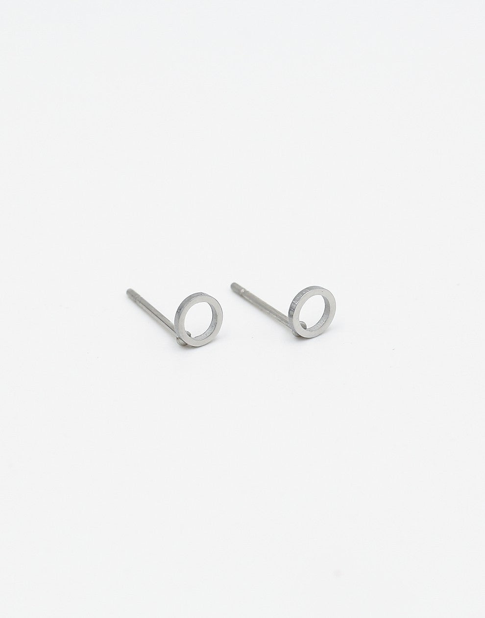 silver-colored open circle earring