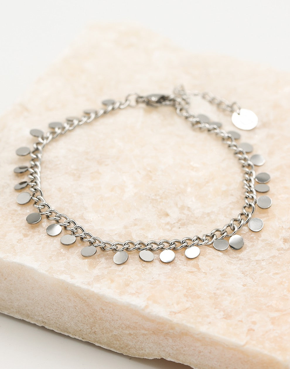 schakelarmband met fijne muntjes zilverkleurig