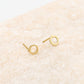 Open circle gold-colored earring