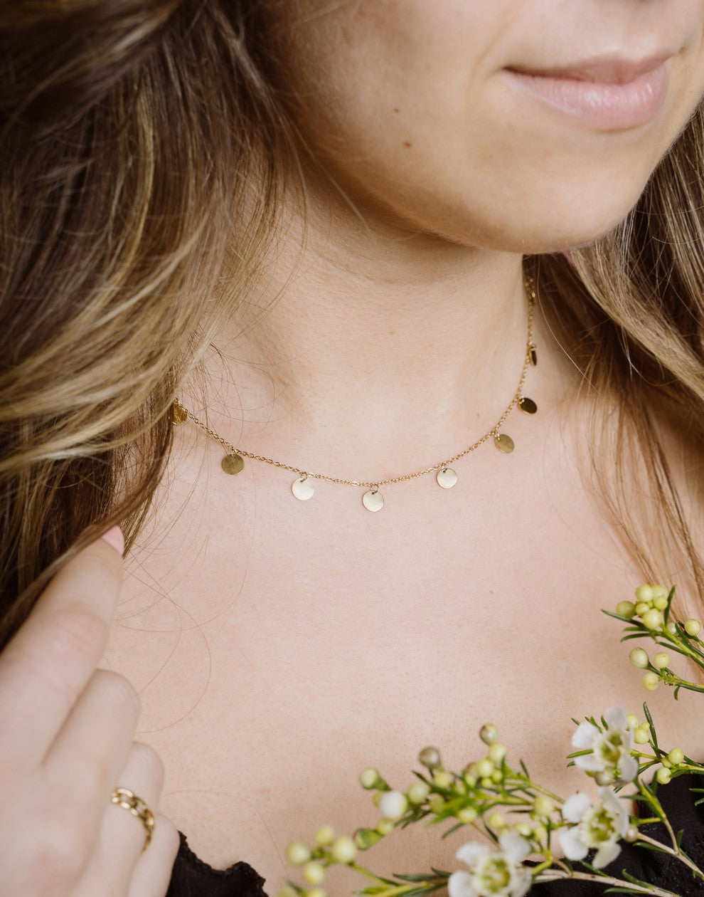 Fijne ketting met muntjes 7mm in goudkleurig
