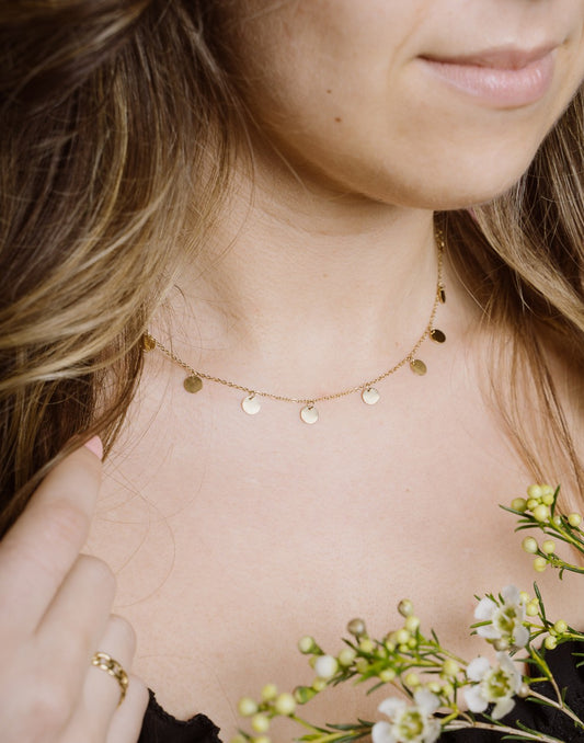 Fijne ketting met muntjes 7mm in goudkleurig