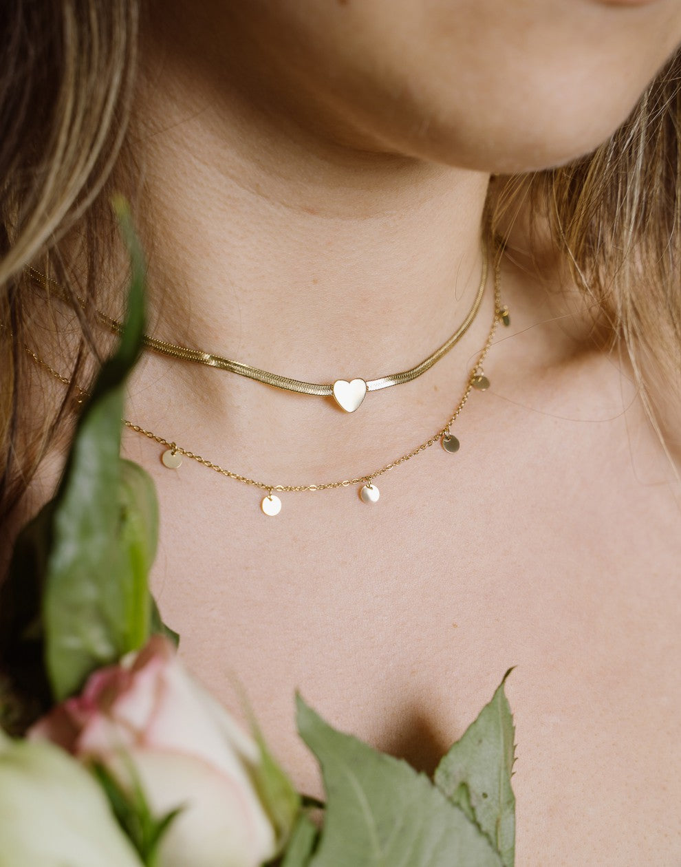 Fijne ketting met muntjes 5mm in goudkleurig