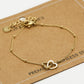 Armband met dubbele hartjes goudkleurig