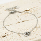 Armband met dubbele hartjes zilverkleurig