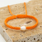 Armband met parel in oranje