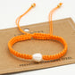 Armband met parel in oranje