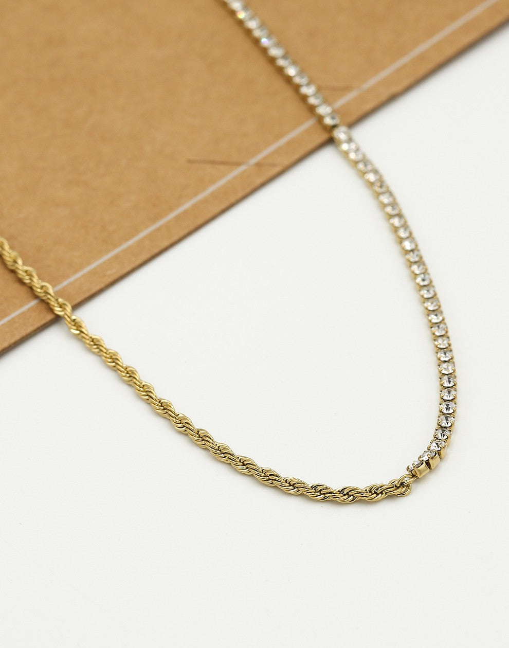 Ketting tennis en gedraaide schakel goudkleurig