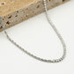 Ketting tennis en gedraaide schakel zilverkleurig