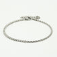 Armband tennis en gedraaide schakel zilverkleurig