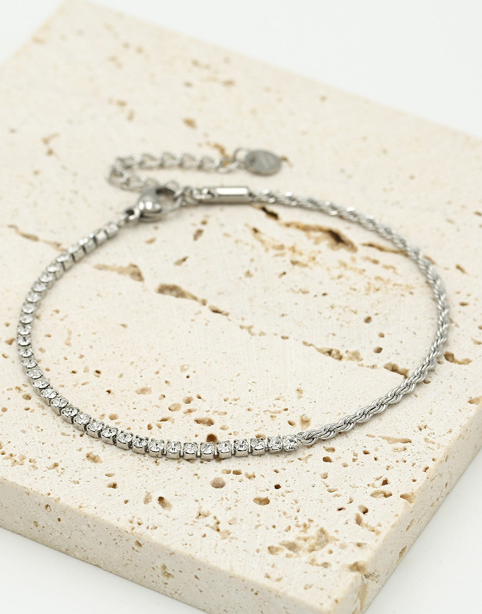 Armband tennis en gedraaide schakel zilverkleurig