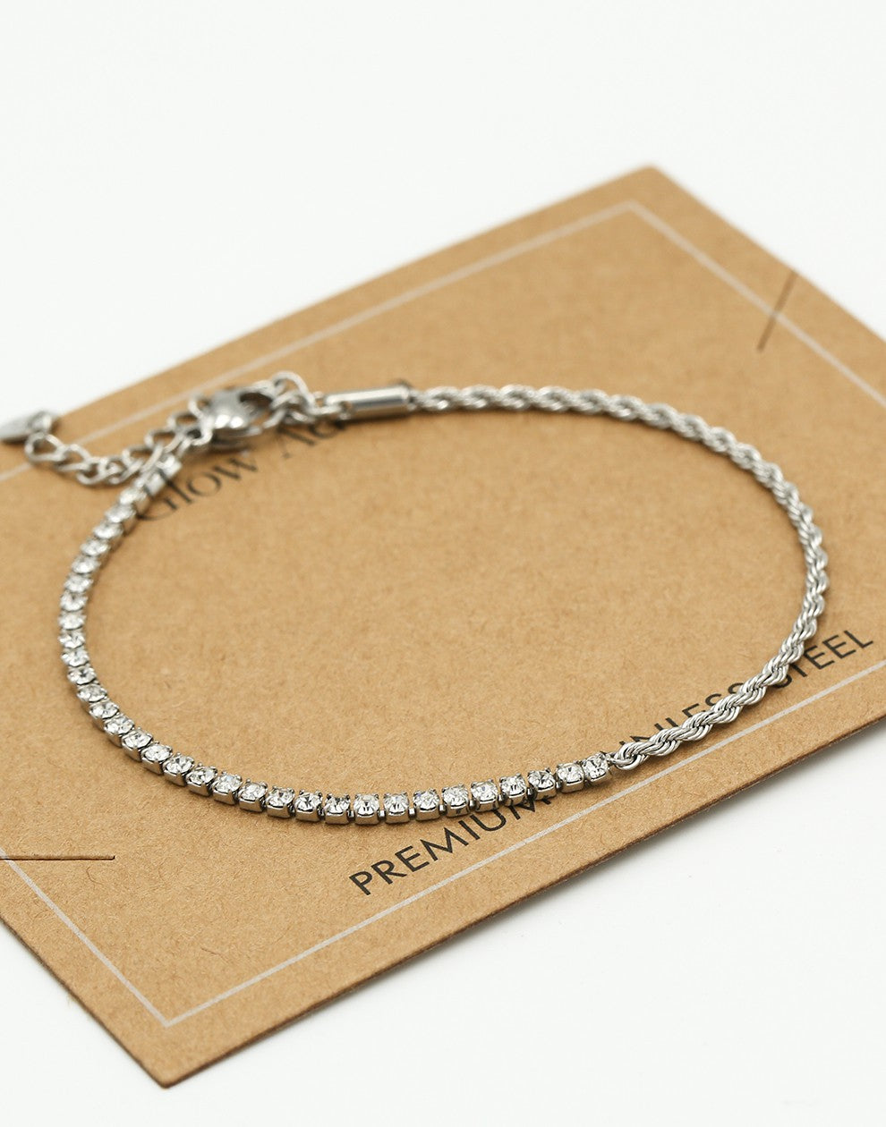 Armband tennis en gedraaide schakel zilverkleurig