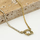 Ketting gedraaide schakel met steentjes en slotje goudkleurig