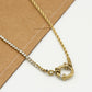 Ketting gedraaide schakel met steentjes en slotje goudkleurig