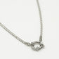 Twisted link necklace with stones and silver-colored clasp