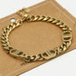 Schakelarmband symbool DD goudkleurig